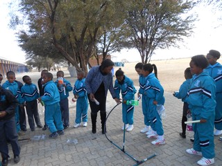 Ms Senna assisting learners at Sol Plaatjies Primary 