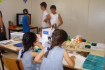 Visitors from the local community exploring the makerspace of the Open Science Centre: Plataforma de Ciência Aberta.