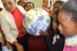 Learners pointing out Cape Town using the Earth Ball 