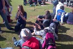 Voortrekker assistant giving a demonstration of pop rocket making