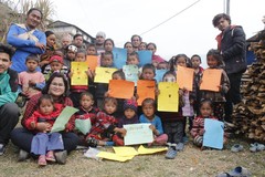 Group photo of primary school students in Nepal.